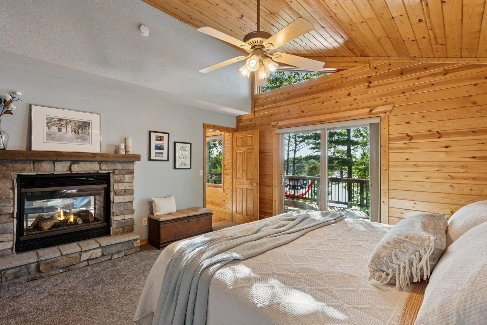 Primary bedroom overlooks lake as well