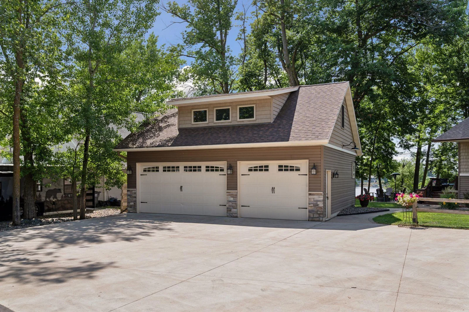 Newer 3 car garage built in 2017 with insulated and heated garage space
