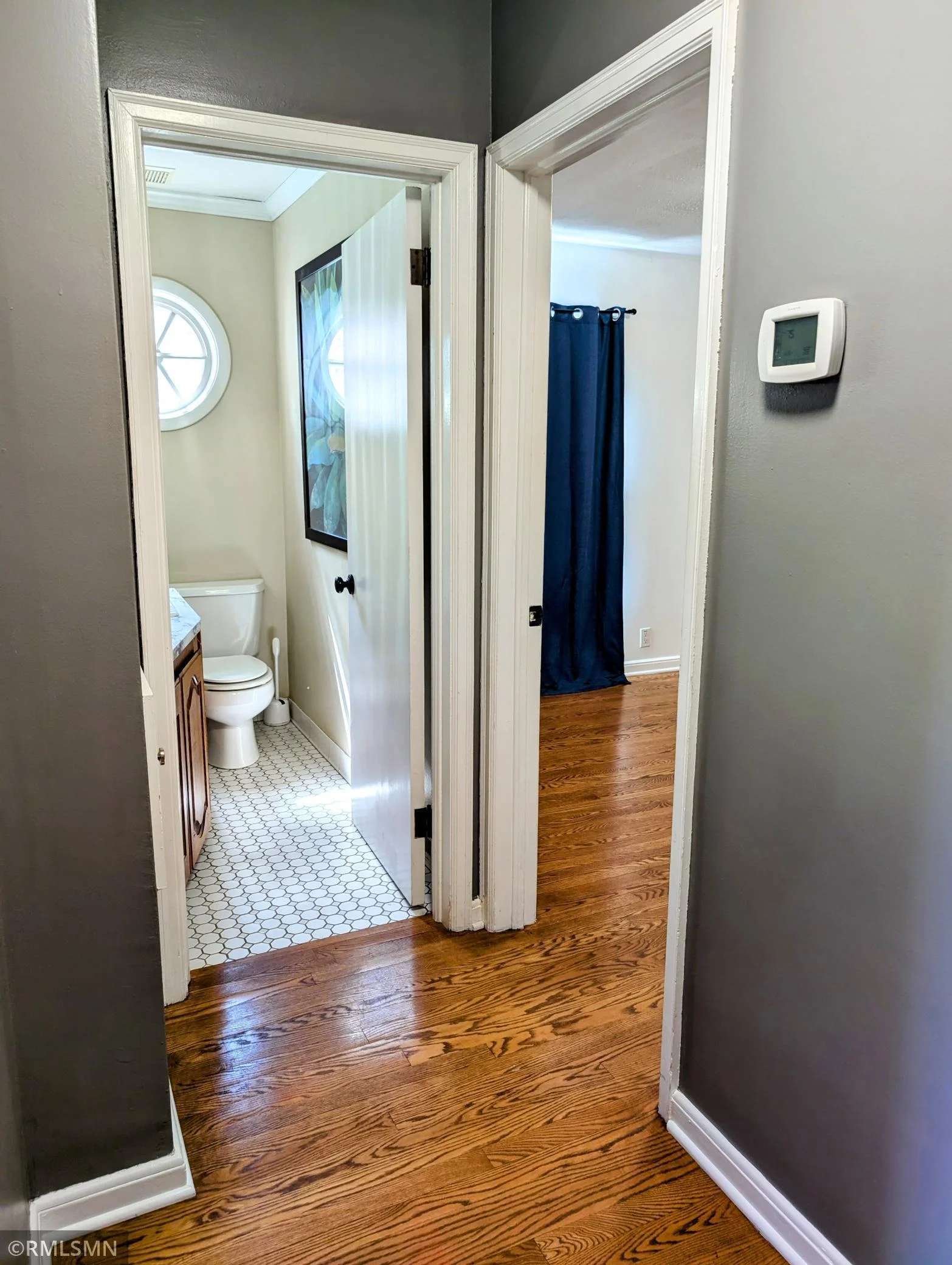 Main floor half bathroom and bedroom