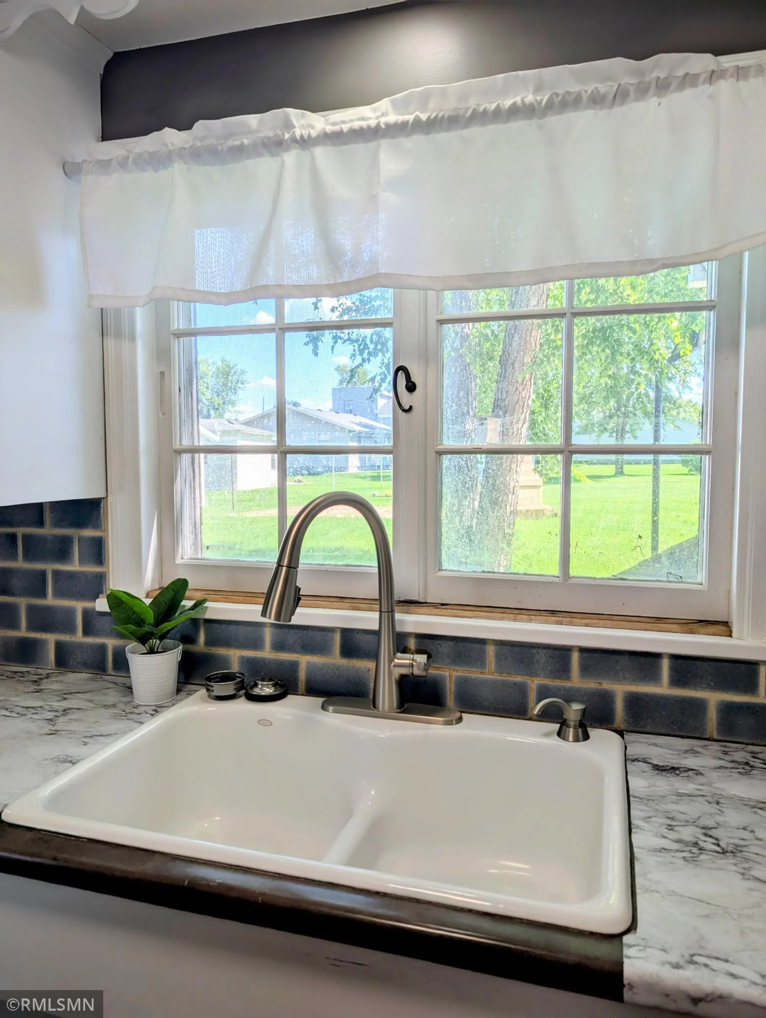 porcelain sink with disposal