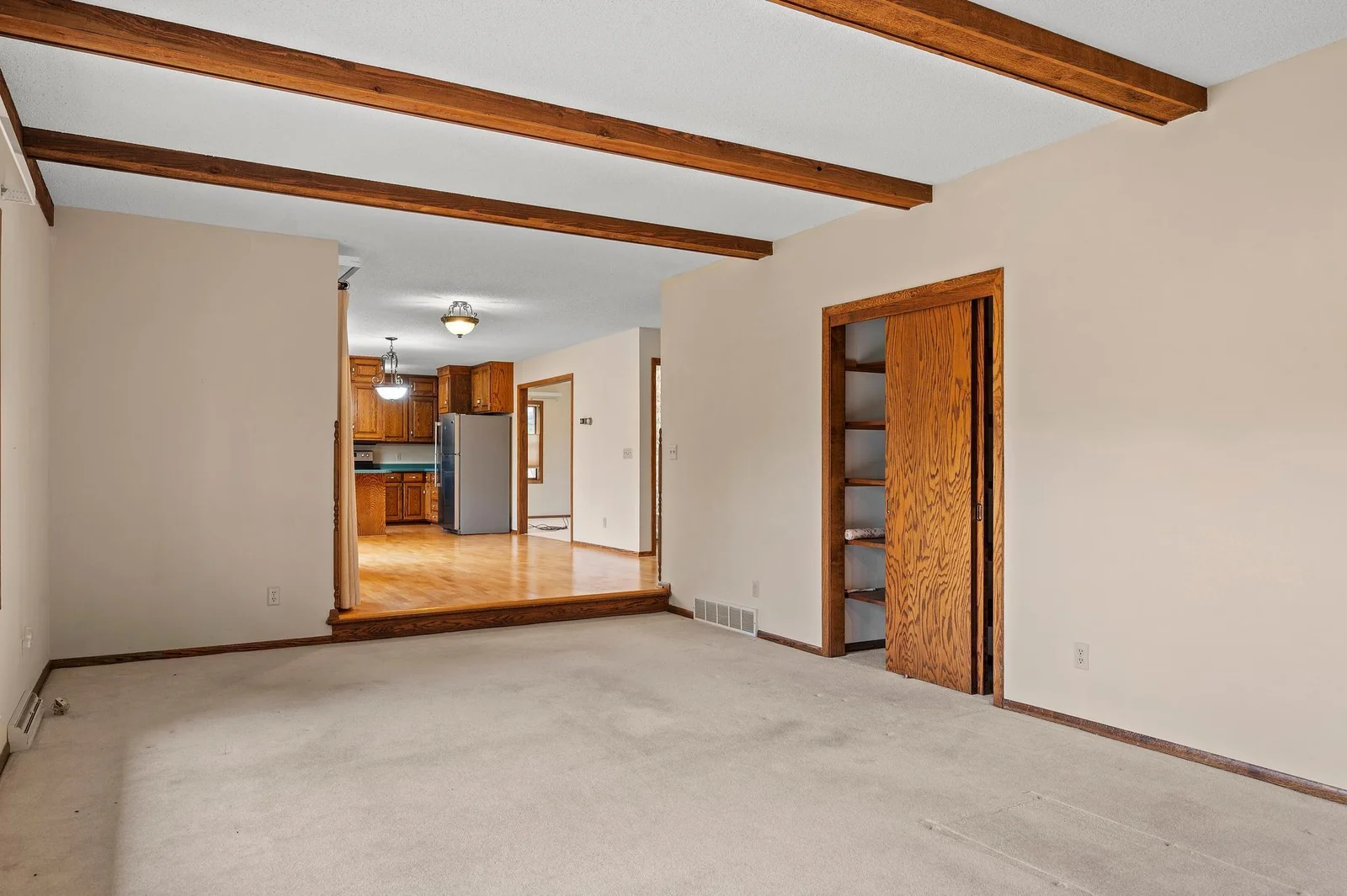 The family room off the dining area also features an additional storage closet - perhaps for games, books and toys!