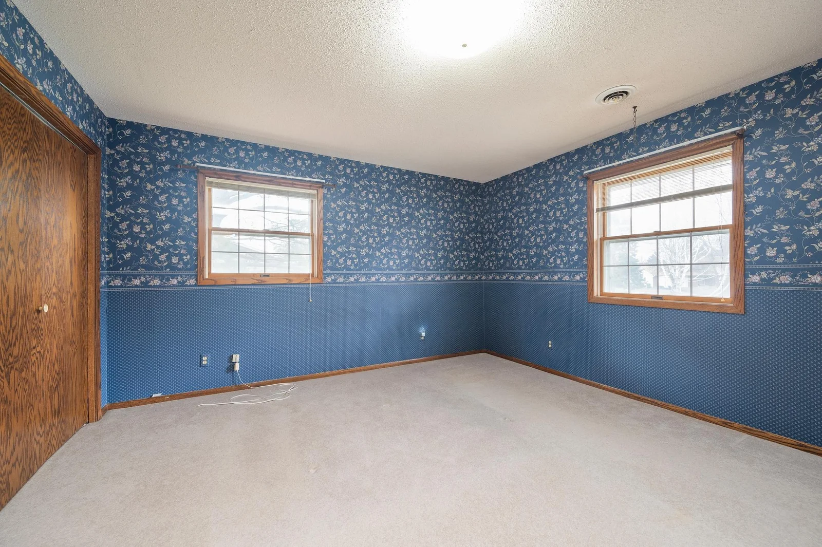 Enjoy your own private bath and great natural light in the primary bedroom.