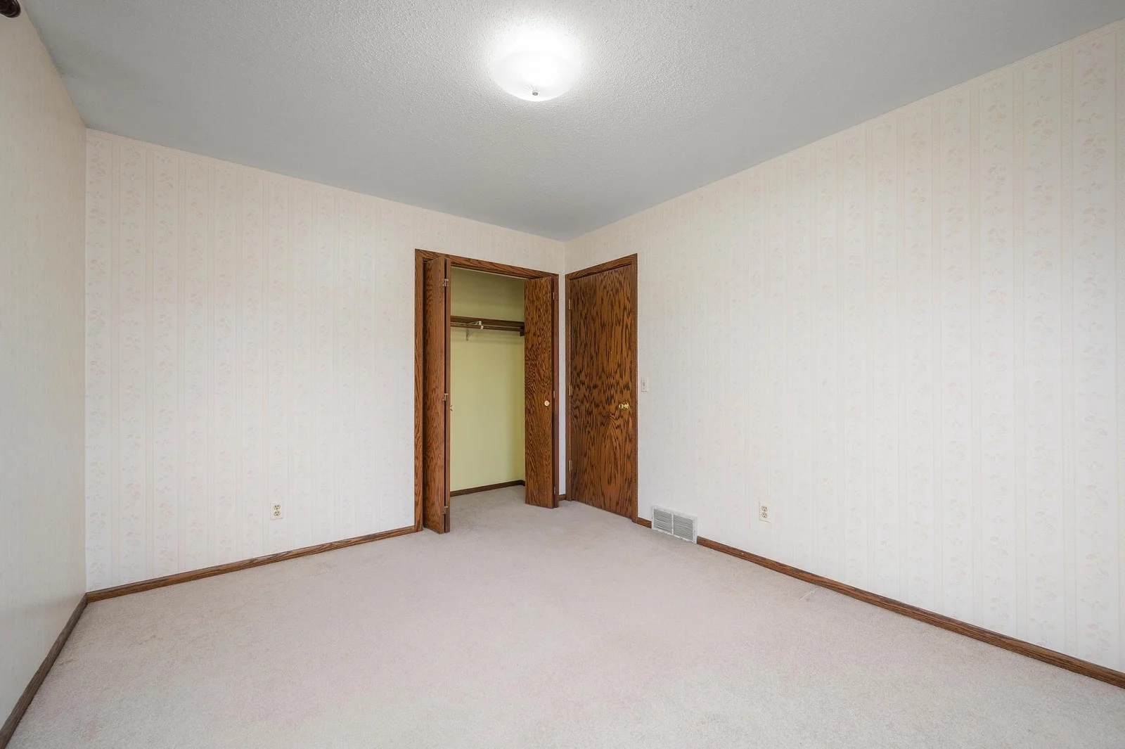 Third bedroom closet and entrance - conviently located across from the upper guest bathroom.