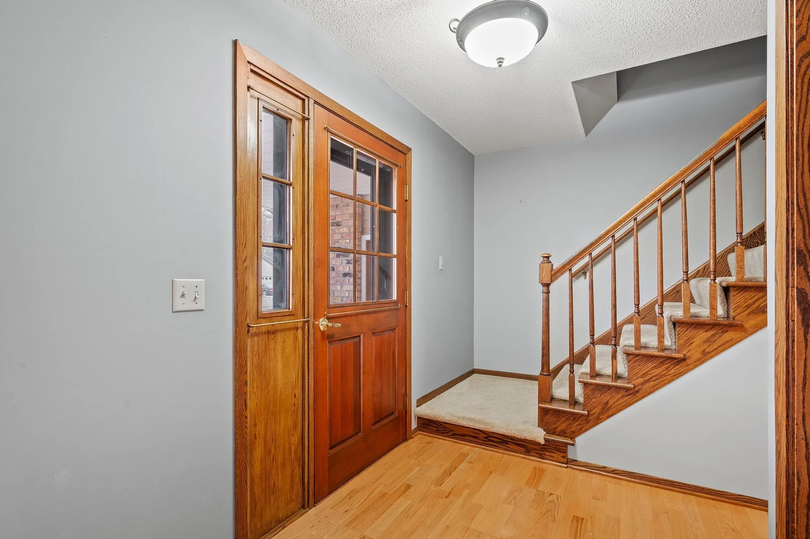 A large inviting Foyer by the front door with plenty of closet space close by.