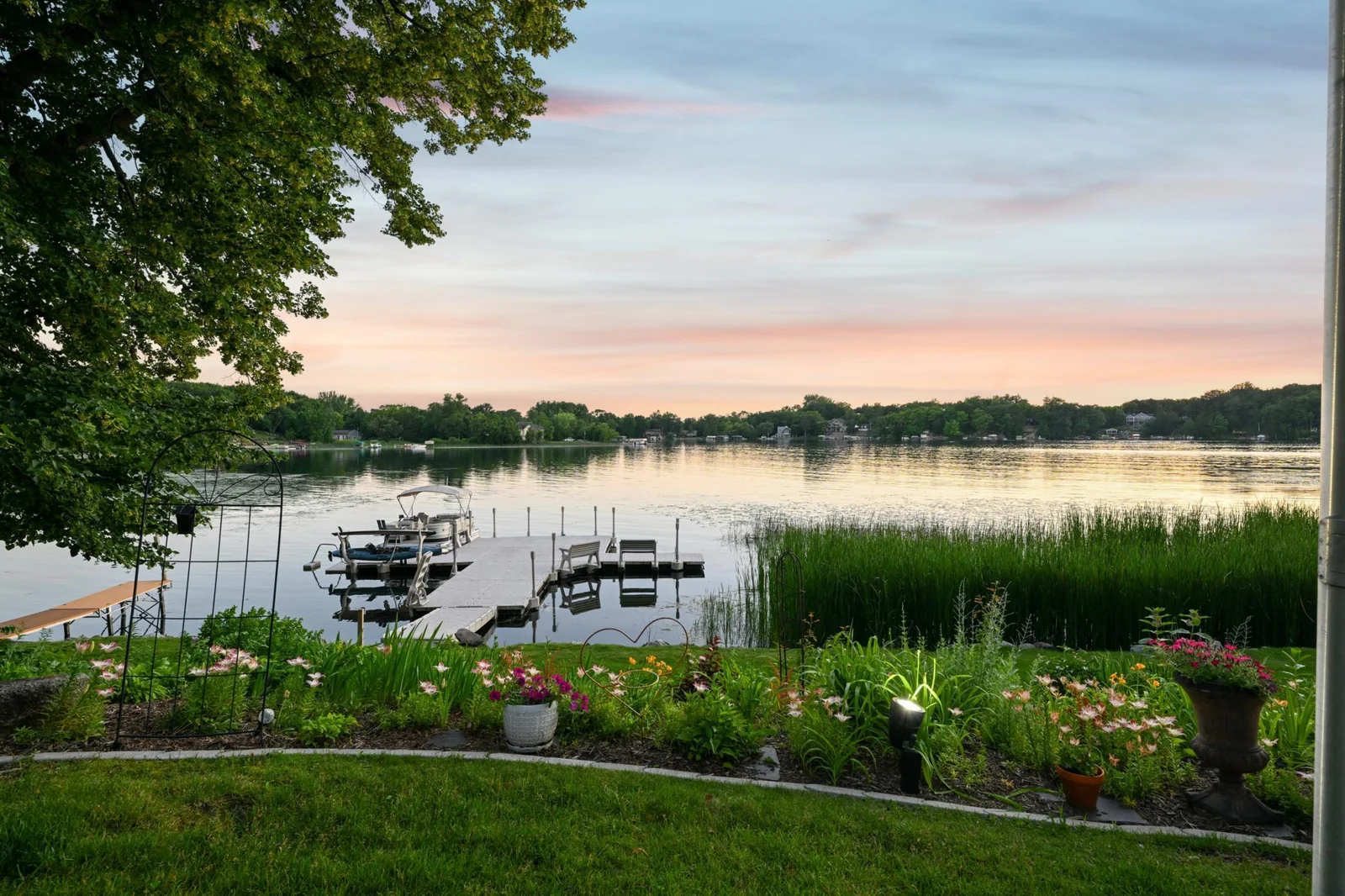 This property features 385 feet of shoreline with two ideal beach areas for swimming, boating, and fishing. Separated by a natural buffer for added privacy and tranquility.