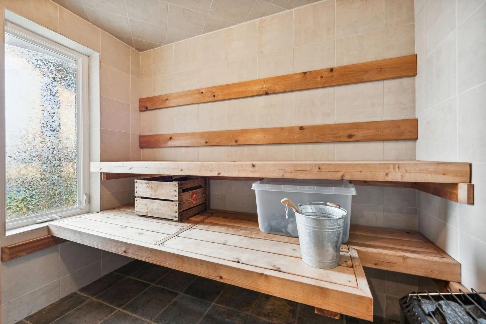 Relax in the lower-level sauna, conveniently located just off the lakeside entry. Perfect for warming up after a day on the water or enjoying year-round wellness.