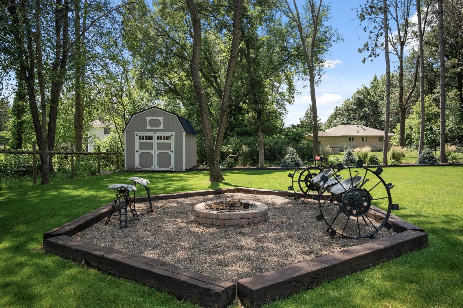 Relax around your firepit! Plus the shed for an added bonus!