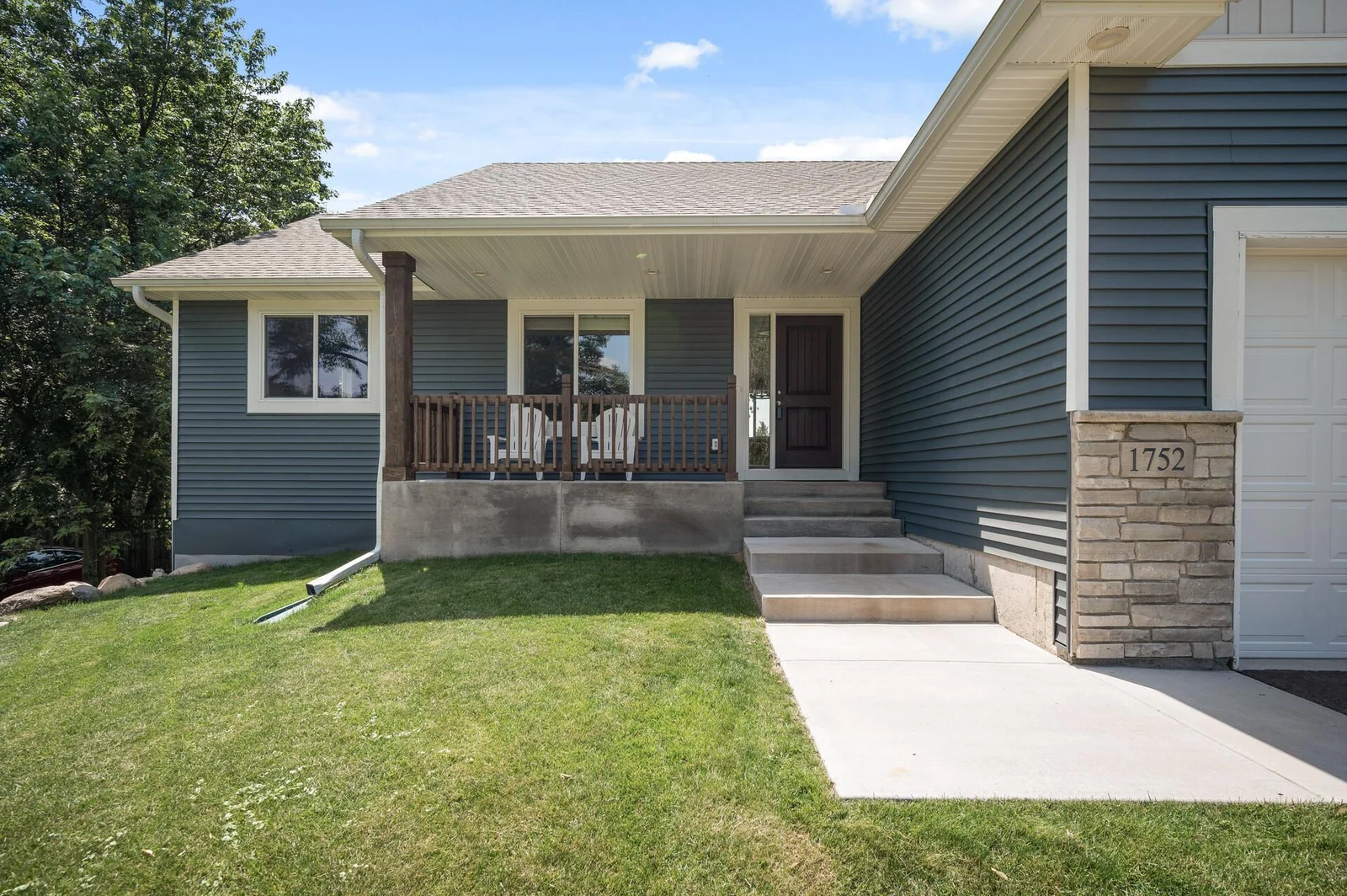 Enjoy the Shade on your inviting front porch!