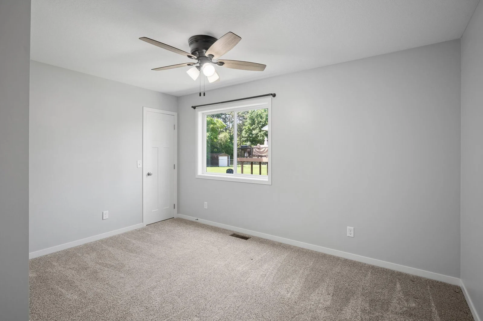 Main floor bedroom #2 with walk in closet.