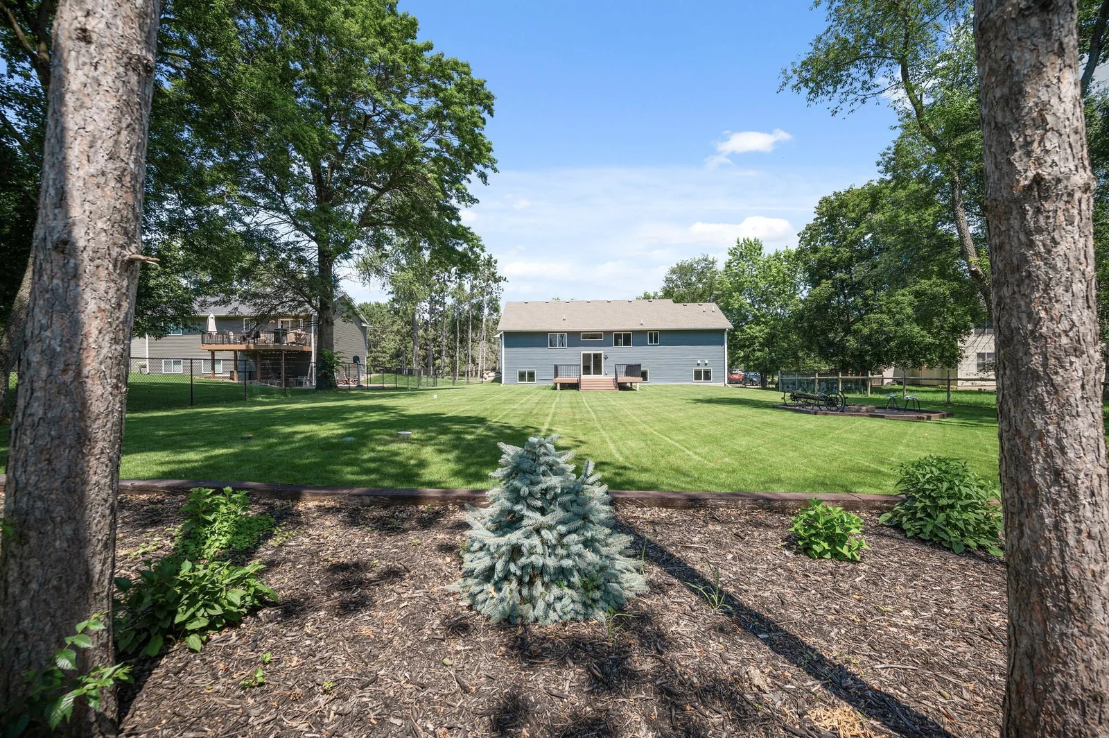 Fully landscaped and fenced yard.