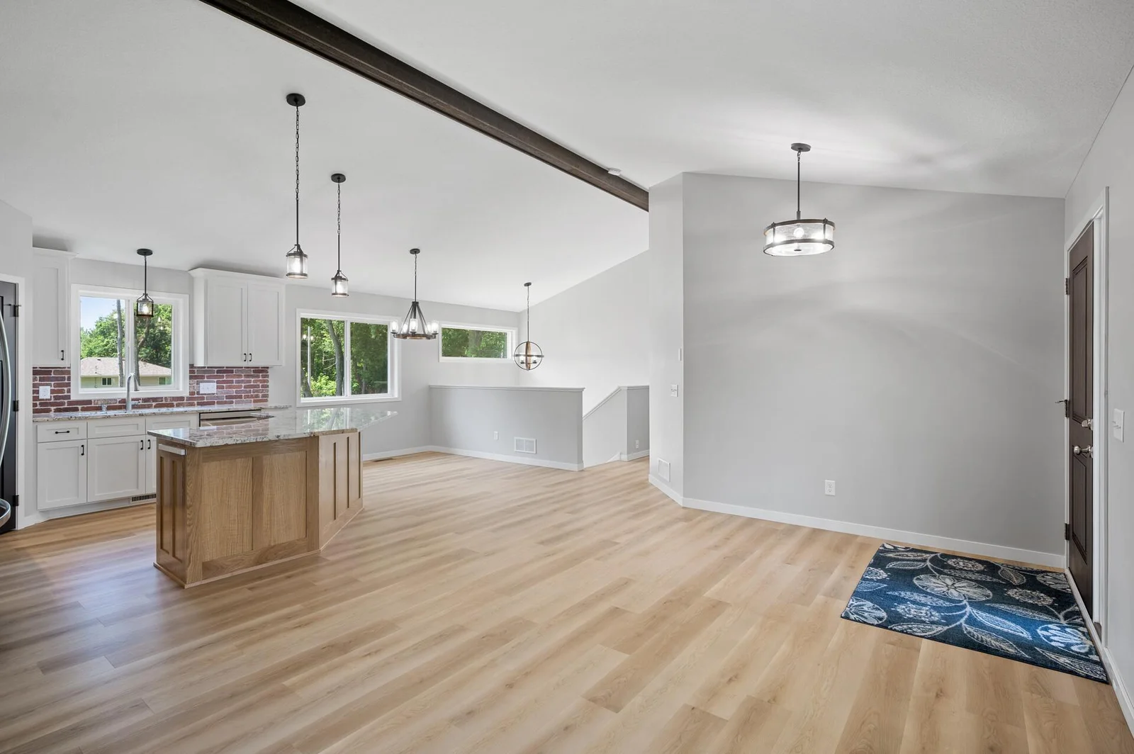 Wood Beam accents the open flowing design!