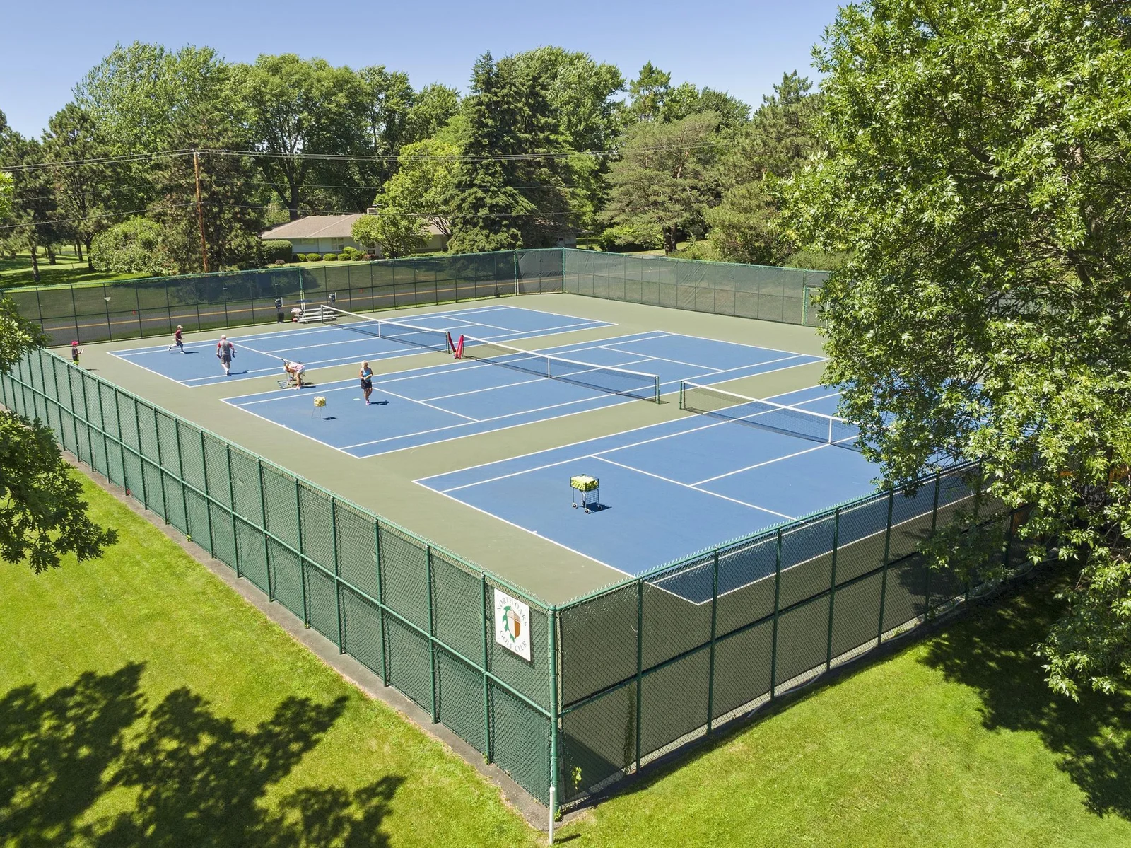 North Oaks Tennis Courts. Lessons available, plus group tennis options for residents!