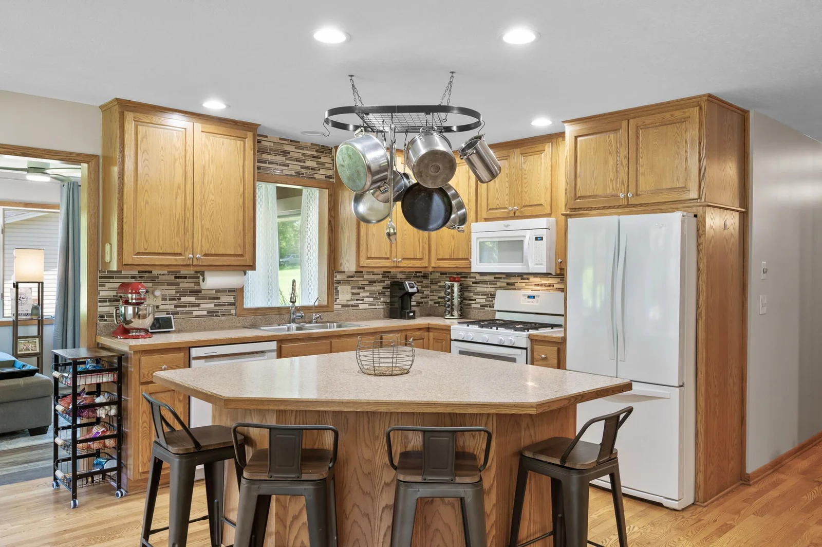 Large island is perfect for baking holiday cookies or gathering around for a celebration