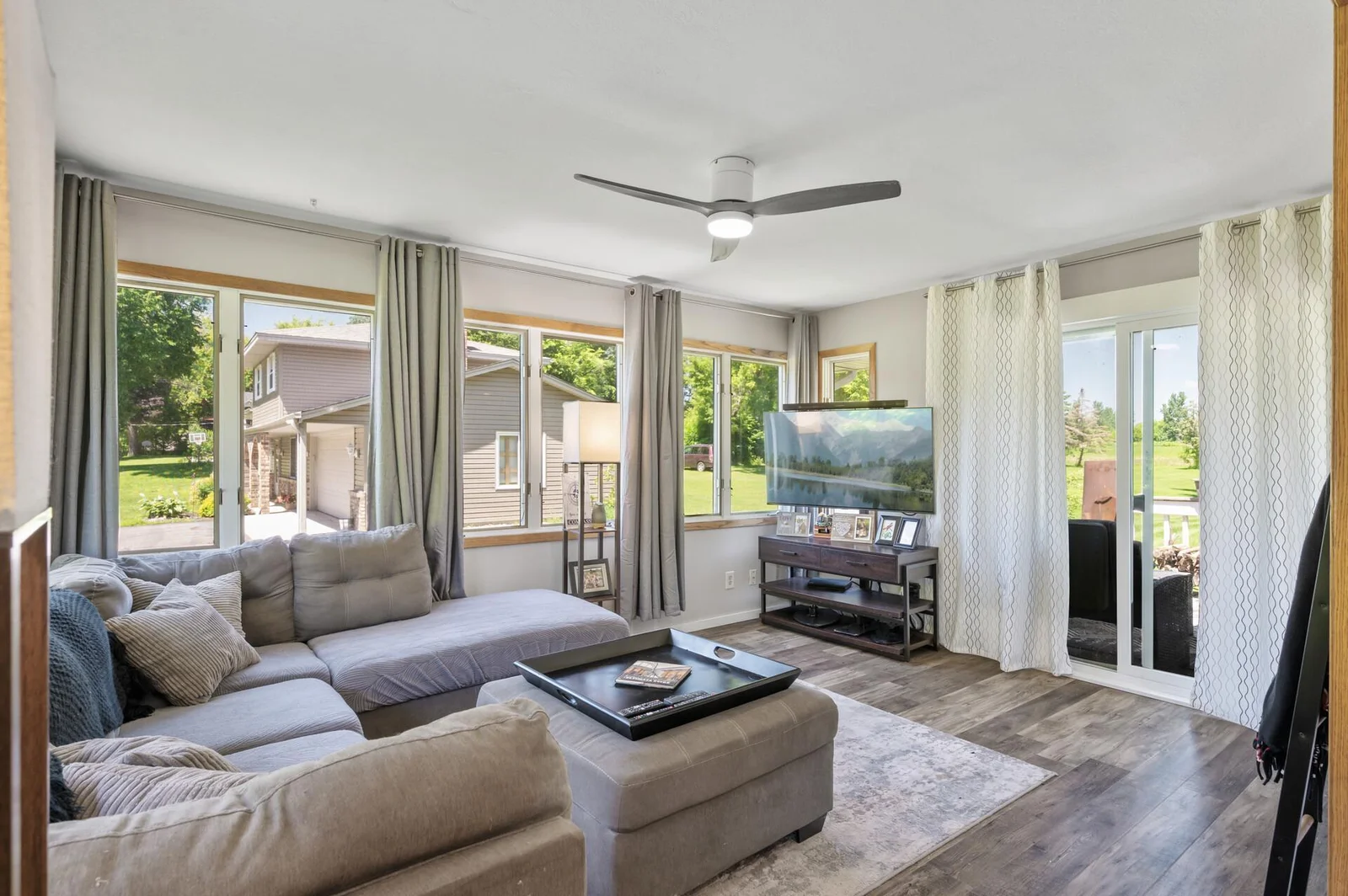Living room with sliding door to one of 2 decks!