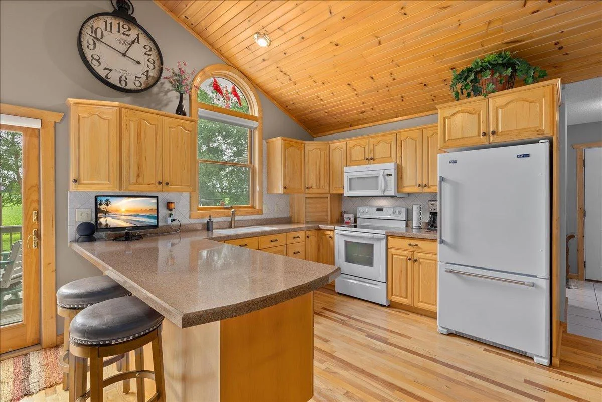 Spacious kitchen with natural wood throughout!