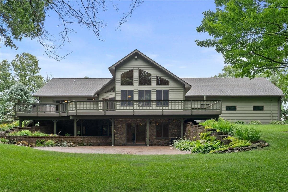 Gorgeous riverfront views from the ultra-private and beautifully landscaped back yard.  You'll enjoy the spacious composite deck and walkout lower level.