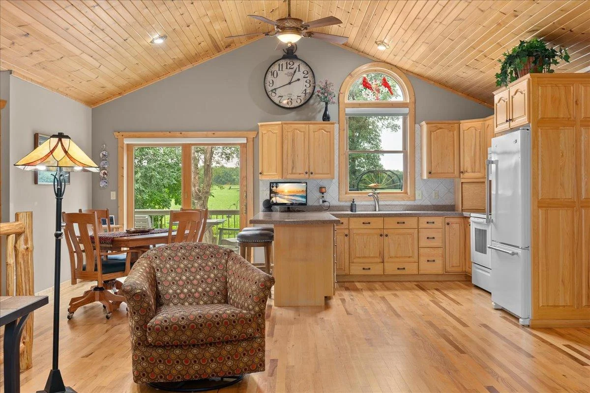 Notice the stained glass window in the kitchen!