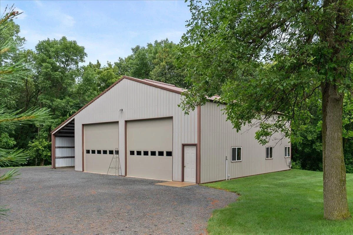 Spacious shed with electric, separate well, and lean-to included!