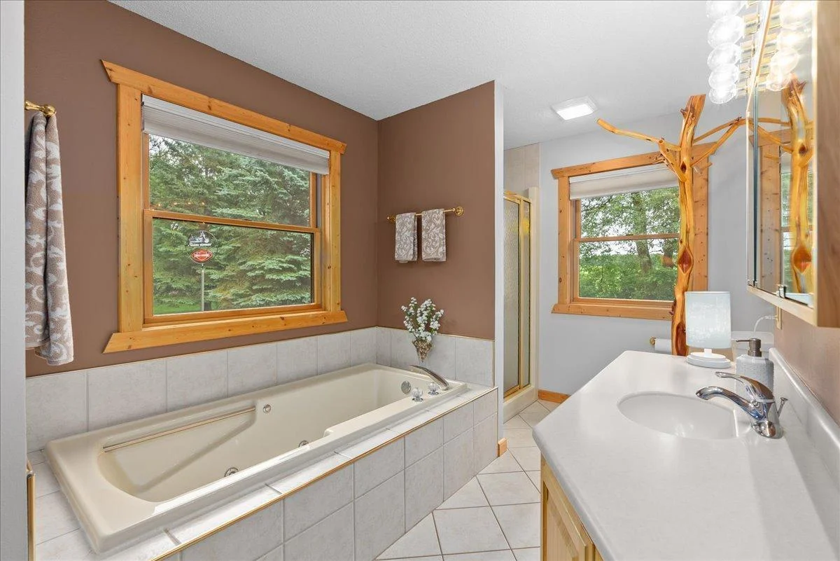 Main level full bath with separate jetted tub and shower!