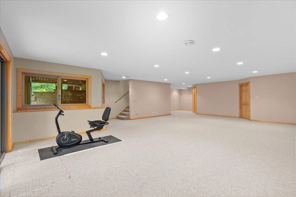 Spacious walkout lower level family room is ready for your needs! Game room, workout area, home theater?