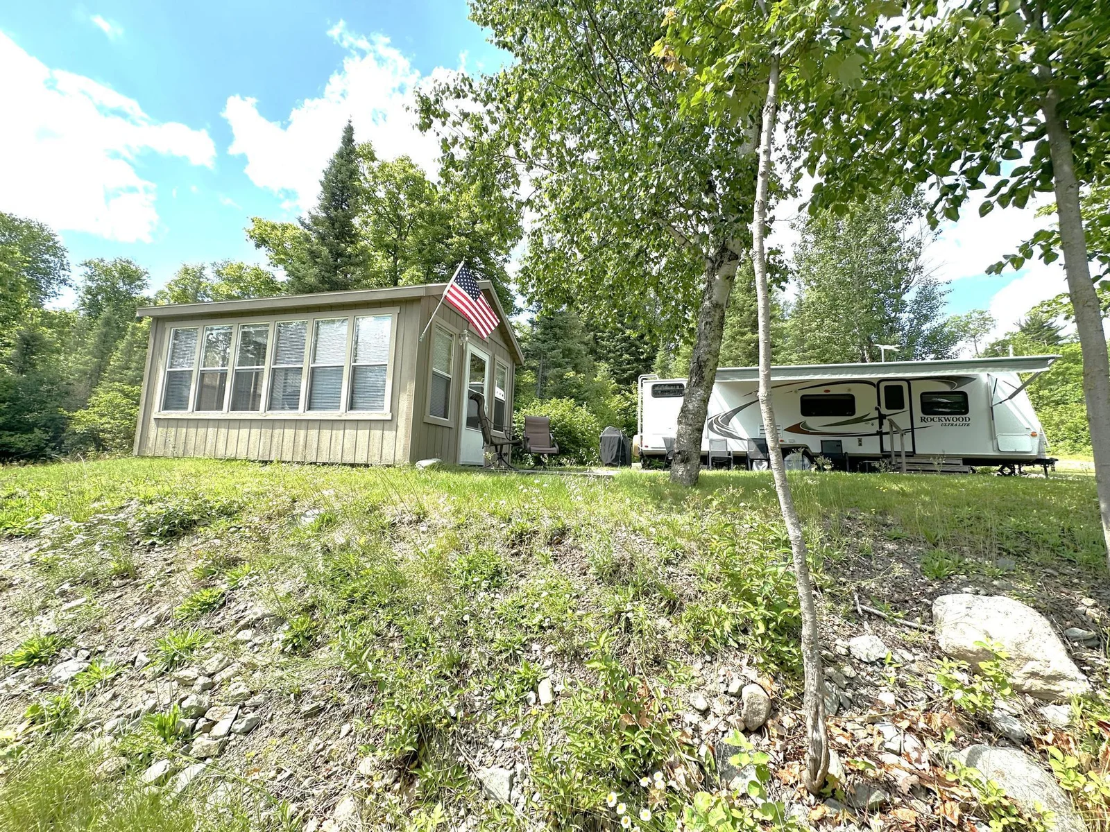 Armstrong sunroom and trailer.JPG