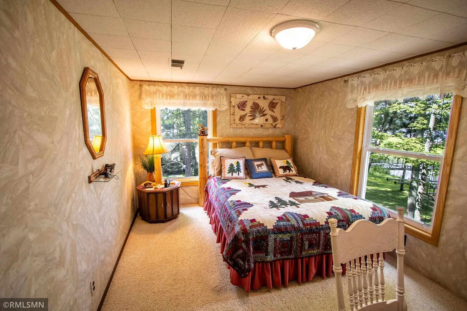 Upstairs bedroom. This bedroom uses an armoire for a closet.