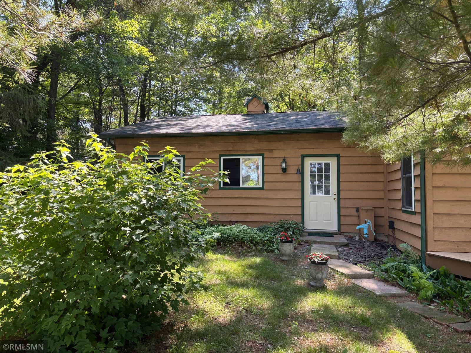 This is a lakeside view of the oversized attached garage.