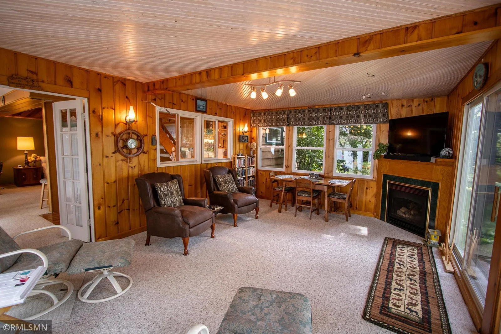 Another view of the porch and the gas fireplace.