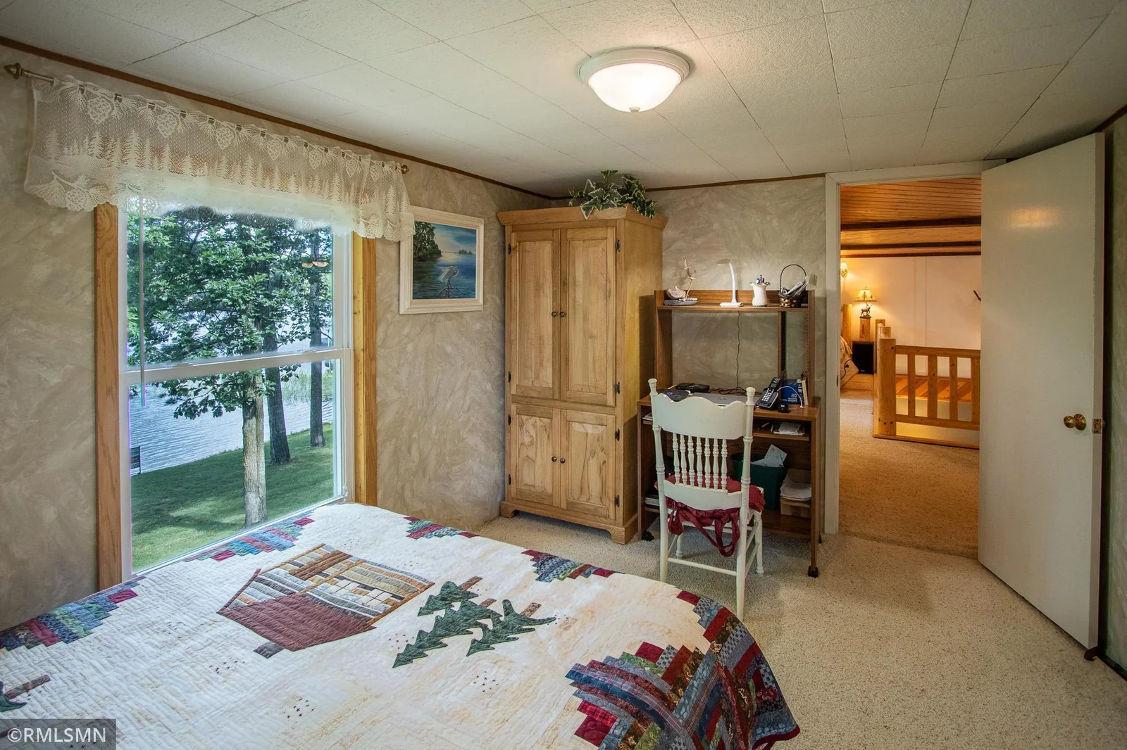 This is another view of that bedroom with the armoire.