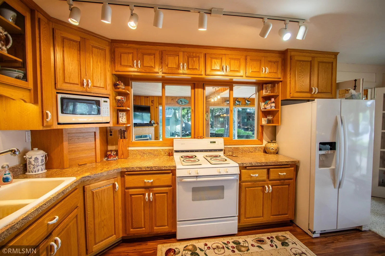 Solid oak cabinets.