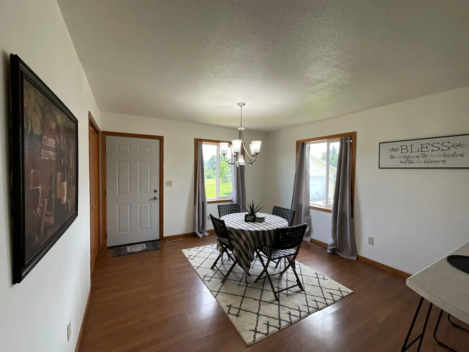 Dinning room off the Kitchen with Back door leading to the New 10 X 12 Deck.jpg