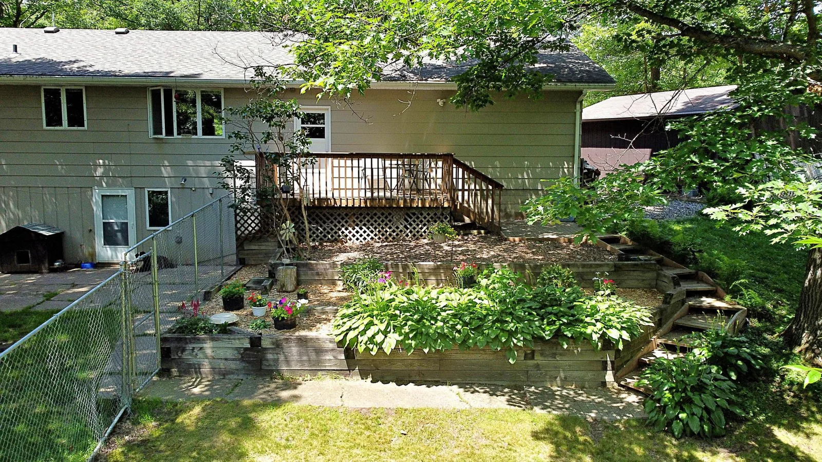 Backyard Overall view with deck patio and landscaping.jpg