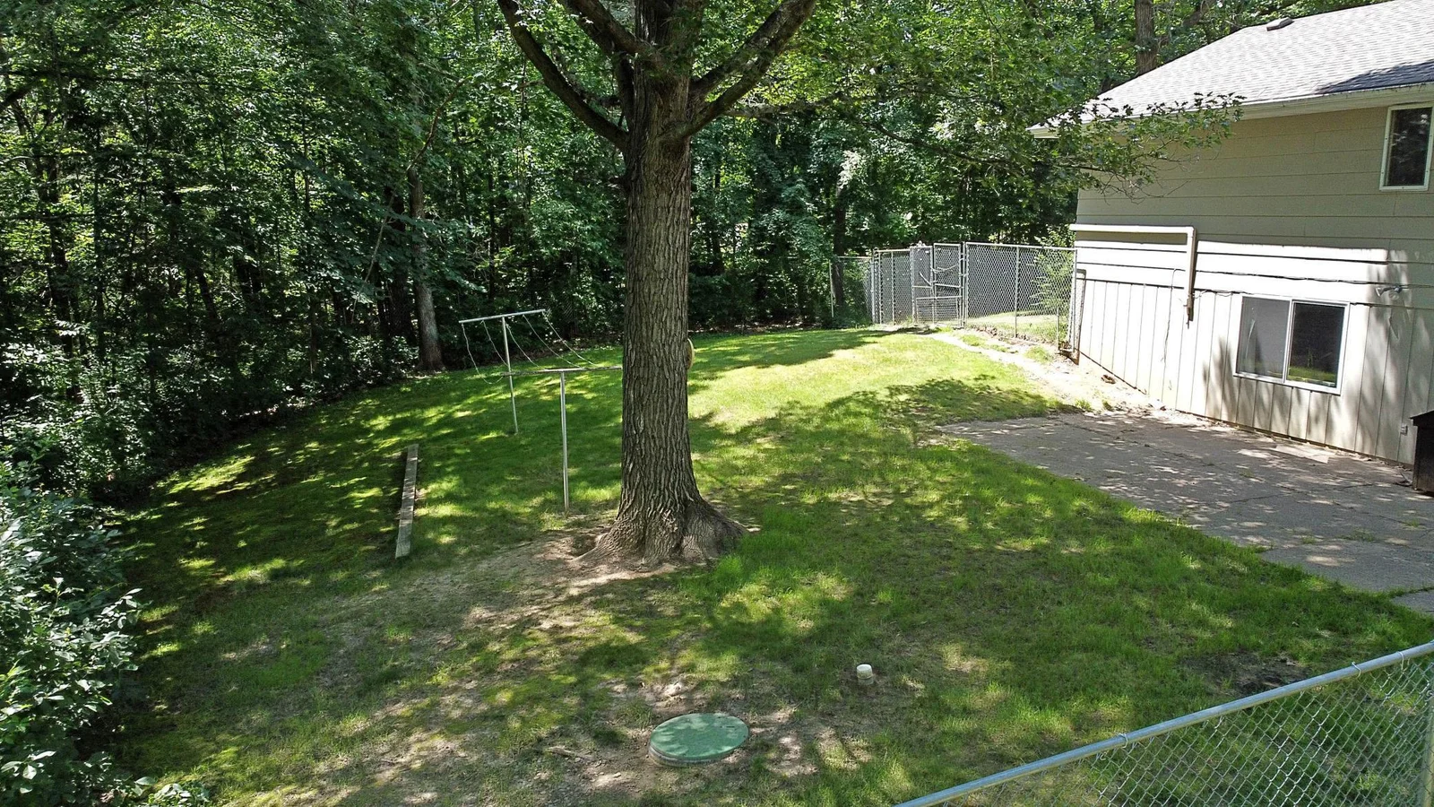 Fenced in grassy yard.jpg