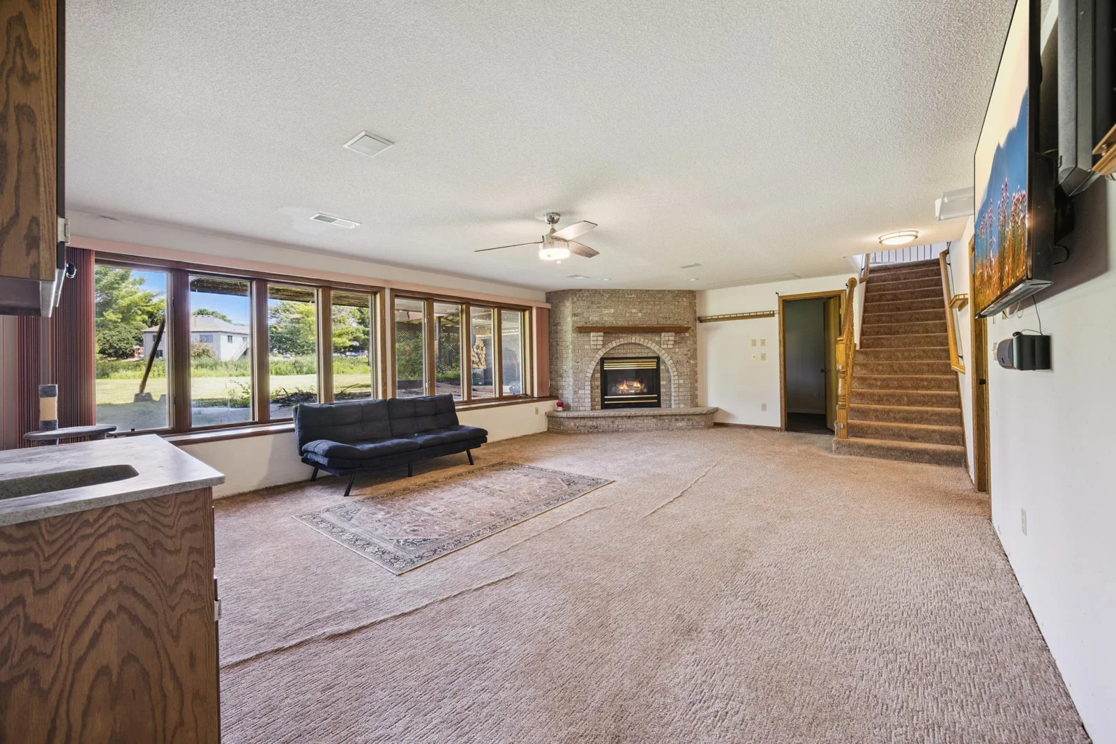 Lower level bathroom with fireplace