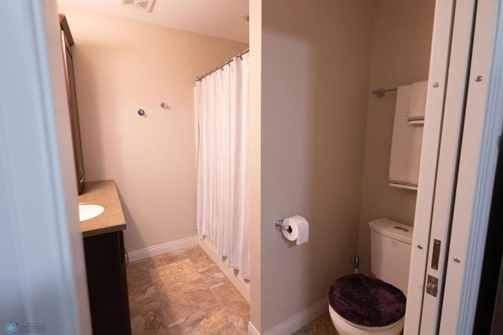 Primary Bedroom En Suite Bathroom.jpg