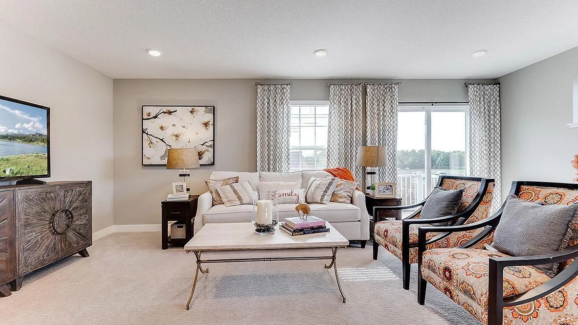 Large windows give the whole main floor a bright and open feel. Model picture shown. Colors and finishes may vary.