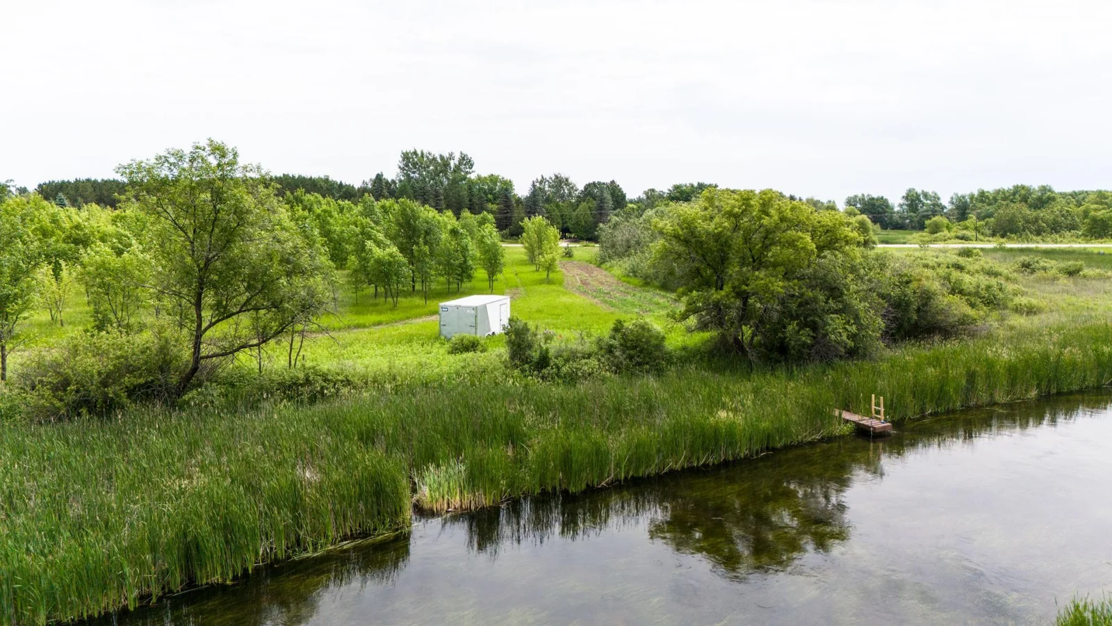 7.39-Acre Lot on the Long Prairie River! Discover your own private escape with 7.39 acres of beautiful land along the Long Prairie River.