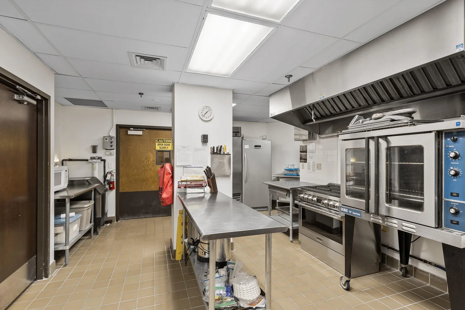 Community room has a commercial kitchen with high end appliances