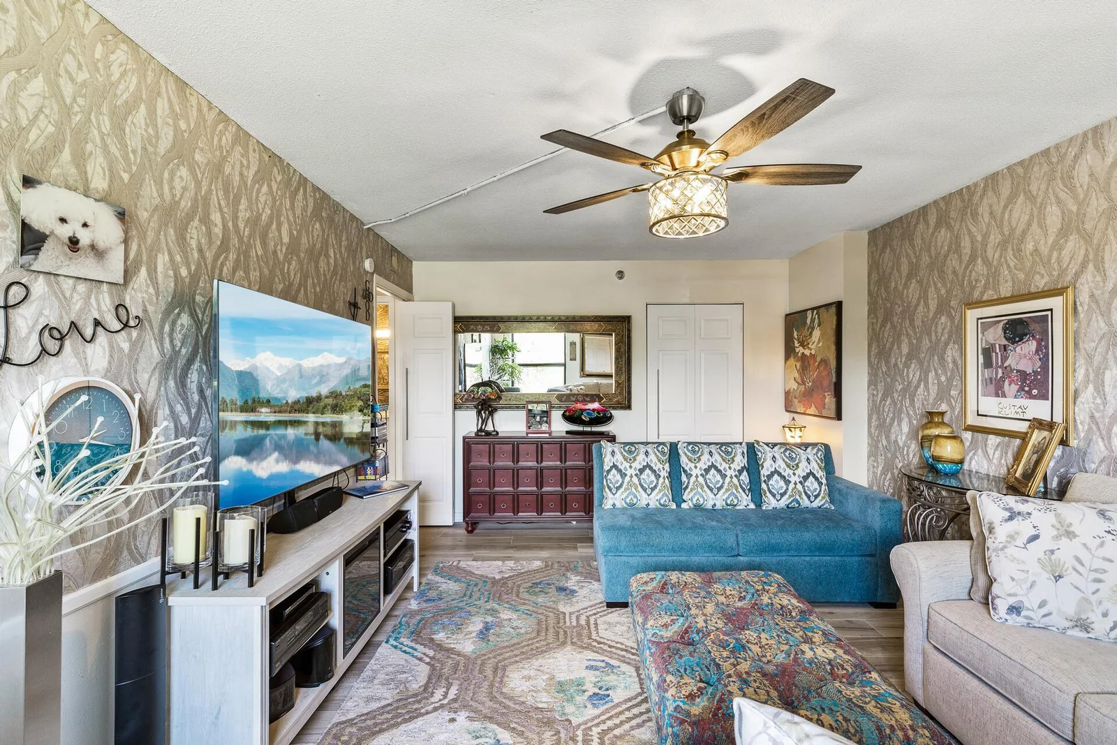 Large primary bedroom suite with walk-in closet, currently used as a den