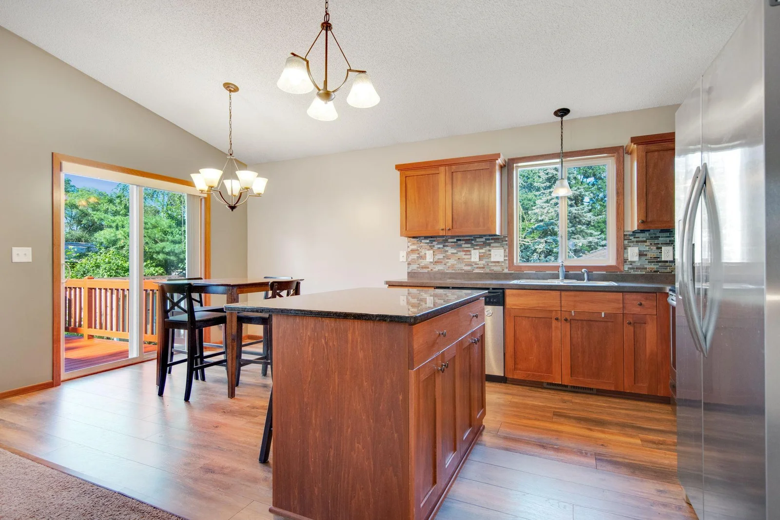 Dining room with sliding door leading to the deck!
