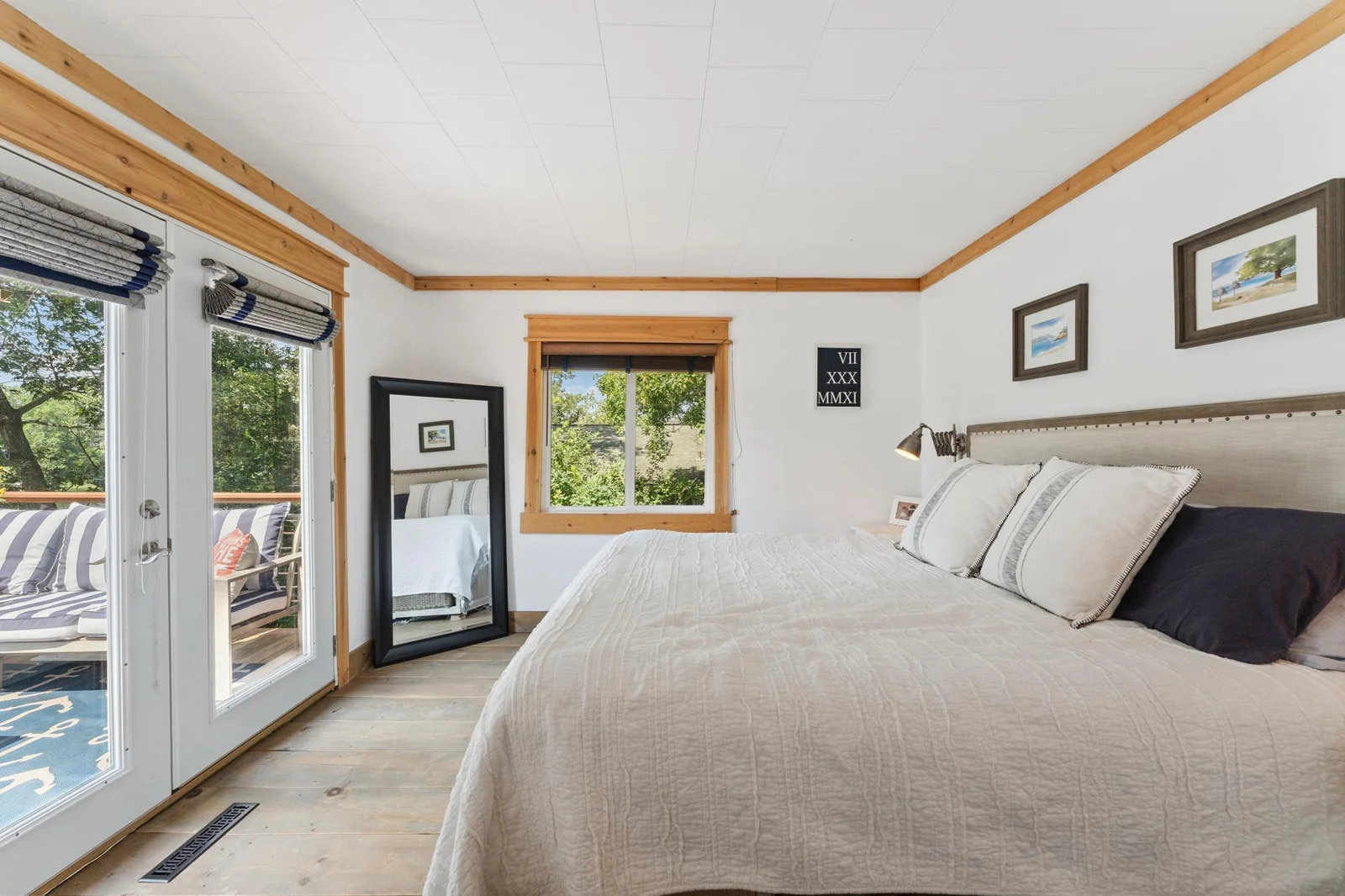 Main level bedroom with views of the lake