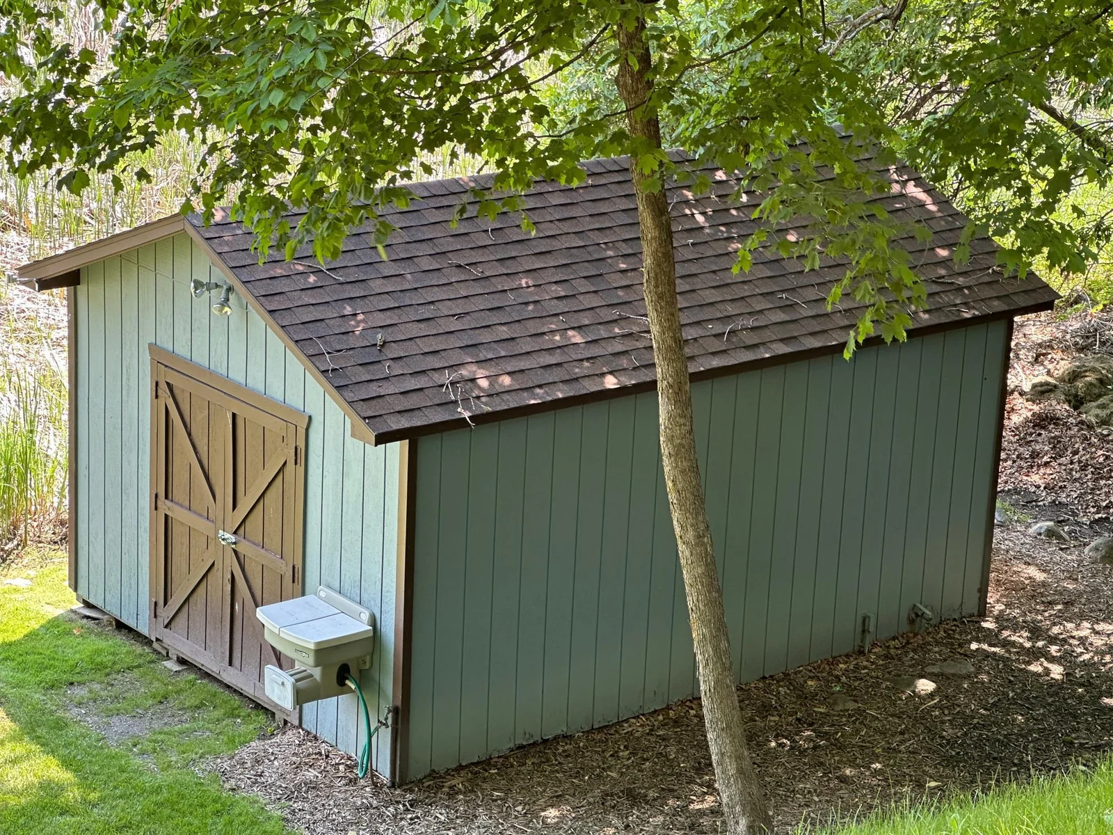 Lake side shed with fish cleaning station.