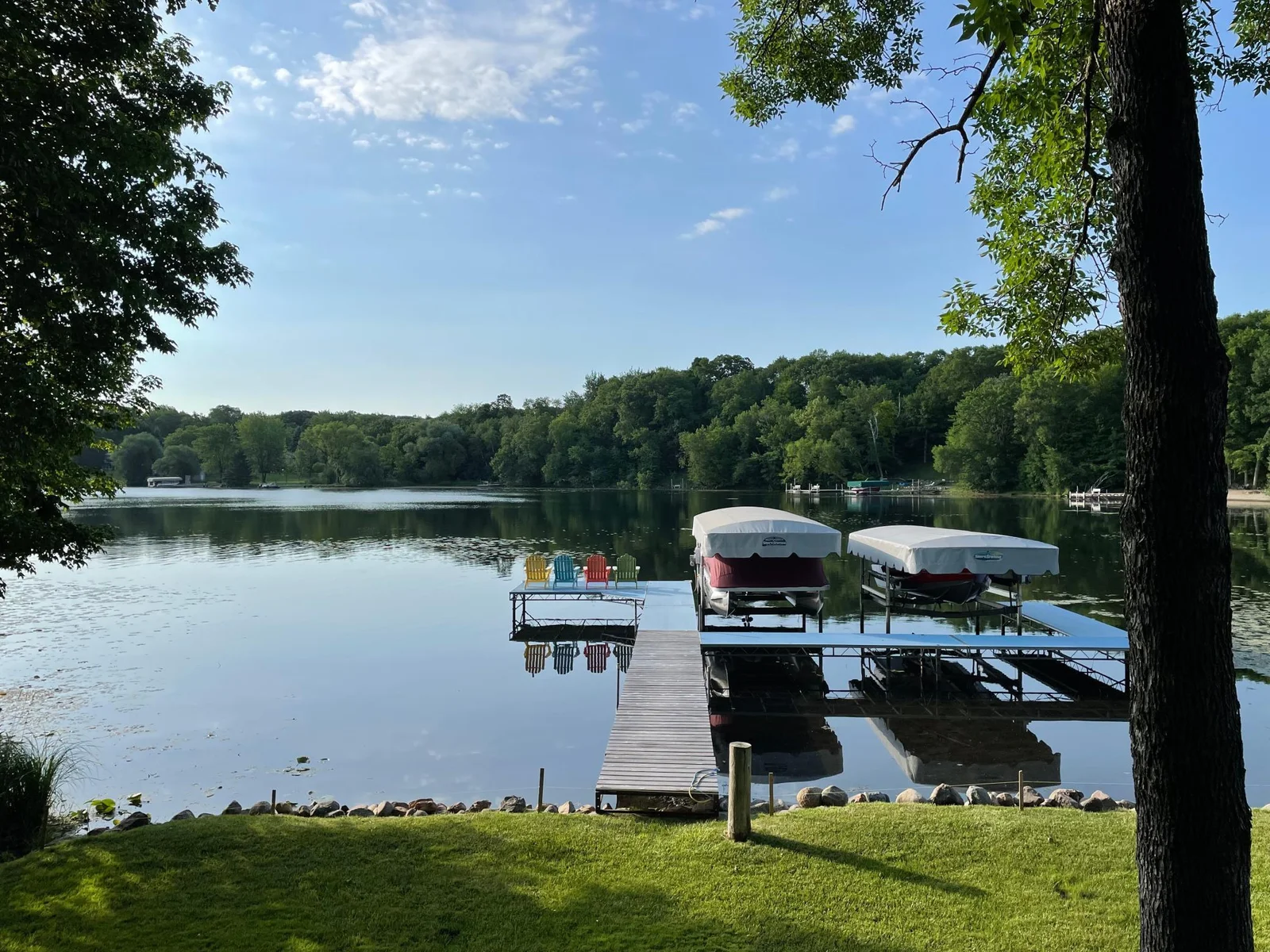 This photo was provided by the sellers.  In addition to the docks and lifts, a 12 ft aluminum fishing boat (unlicensed), lake weed rake and assorted lift removal tools will remain.   Imagine soaking up that view!