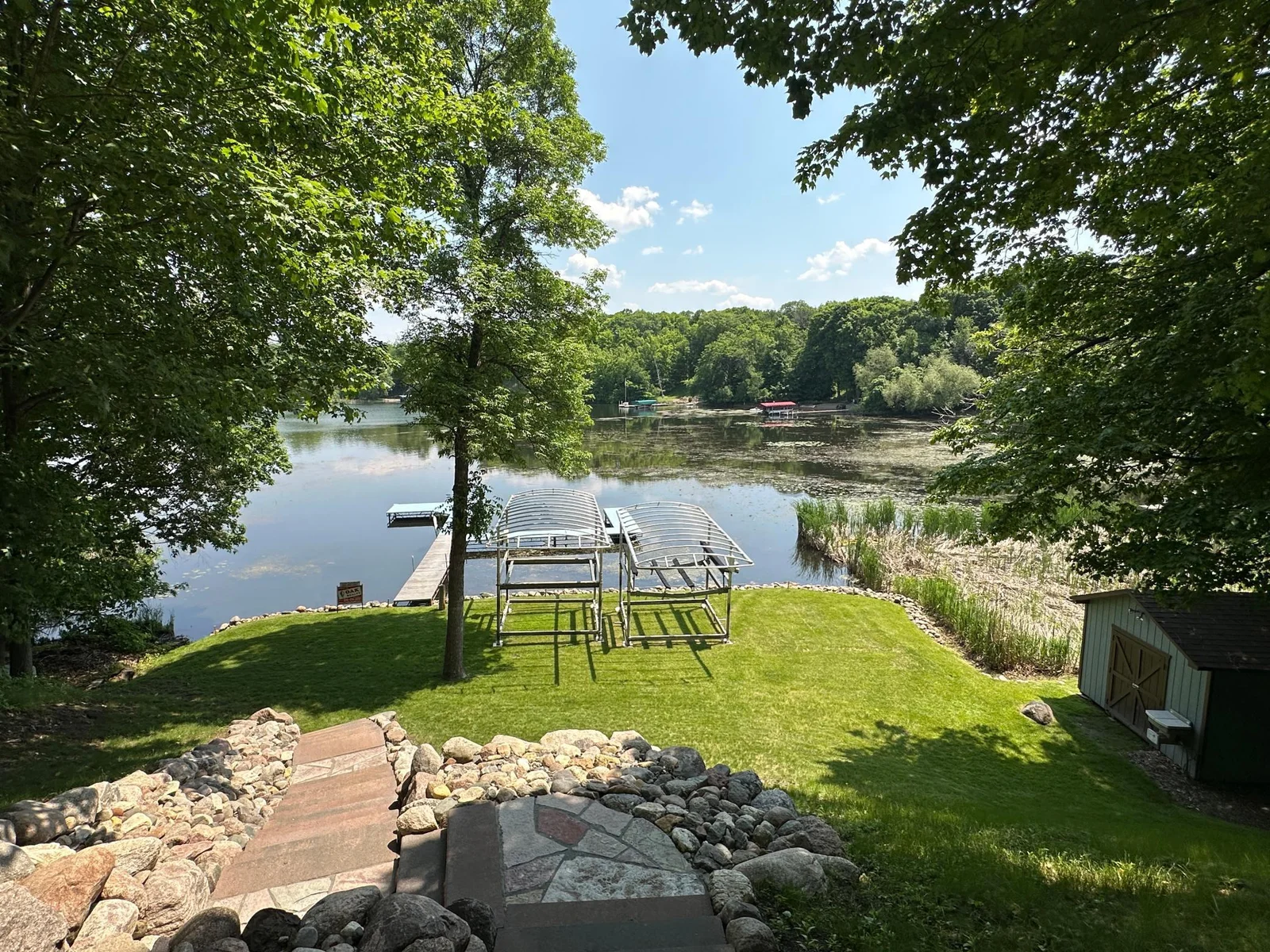 Included in the sale are 2 AC (electric) 4000lb and 2500lb boatlifts with canopies, 72 feet (5 sections) aluminum dock sections with wheels, 12ft x 8ft aluminum sundeck with wheels and 4ft wedge section. 32ft steel dock with 8 wood dock sIMG_5954.JPG