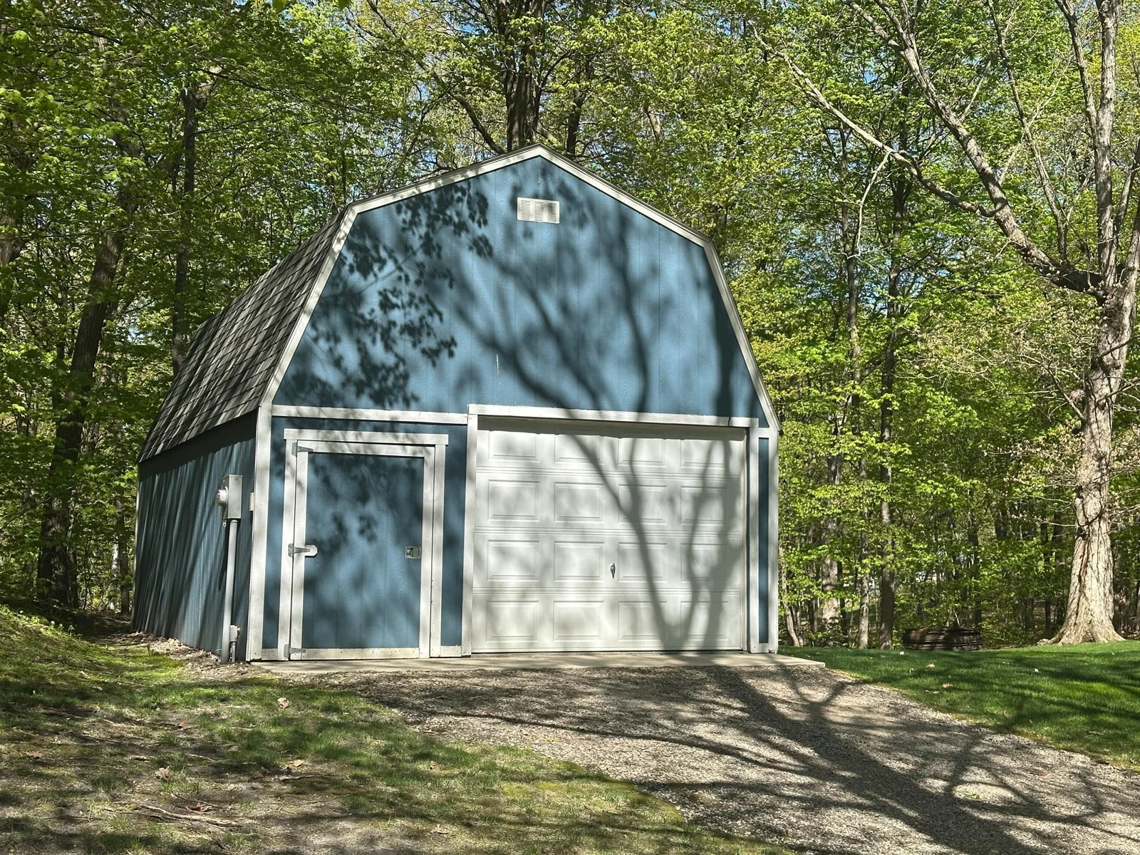 This additional detached garage measures 24 x 16 and has a cement floor.  It sits on the additional back lot.