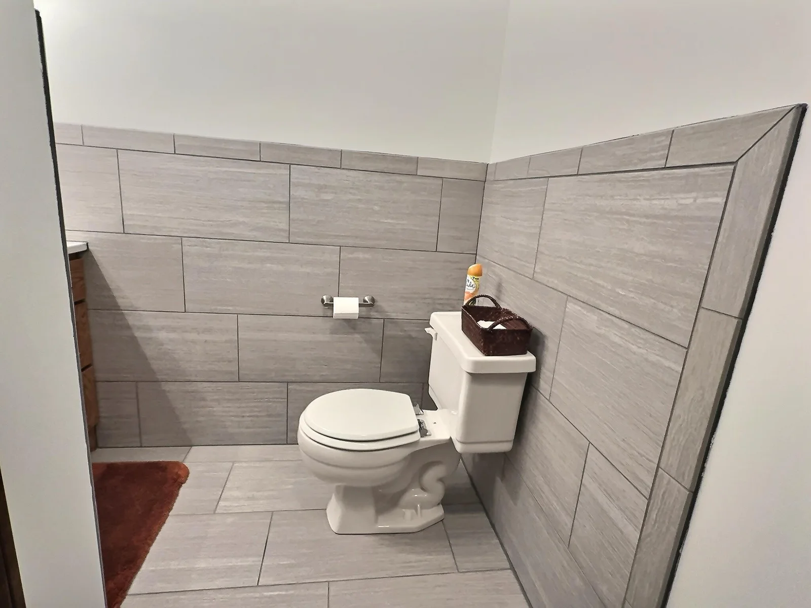 Lower-level half bath has been recently updated