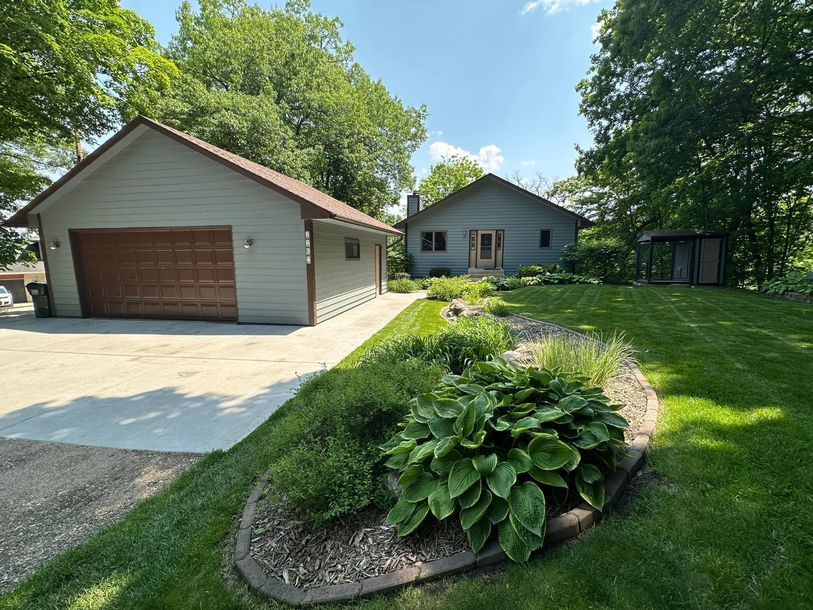 Beautiful Perineal gardens surround the property.