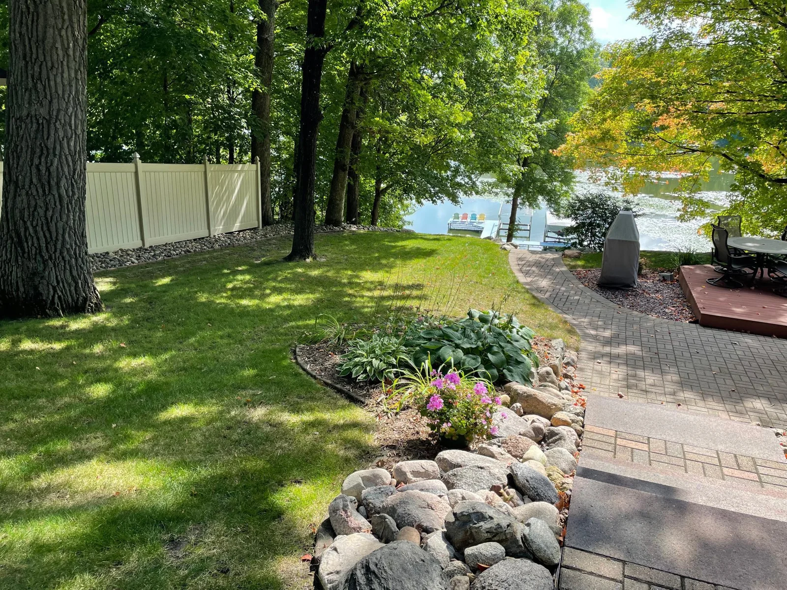Stone staircase to the lake.  An underground irrigation system keeps the lawn green and lush all summer.
