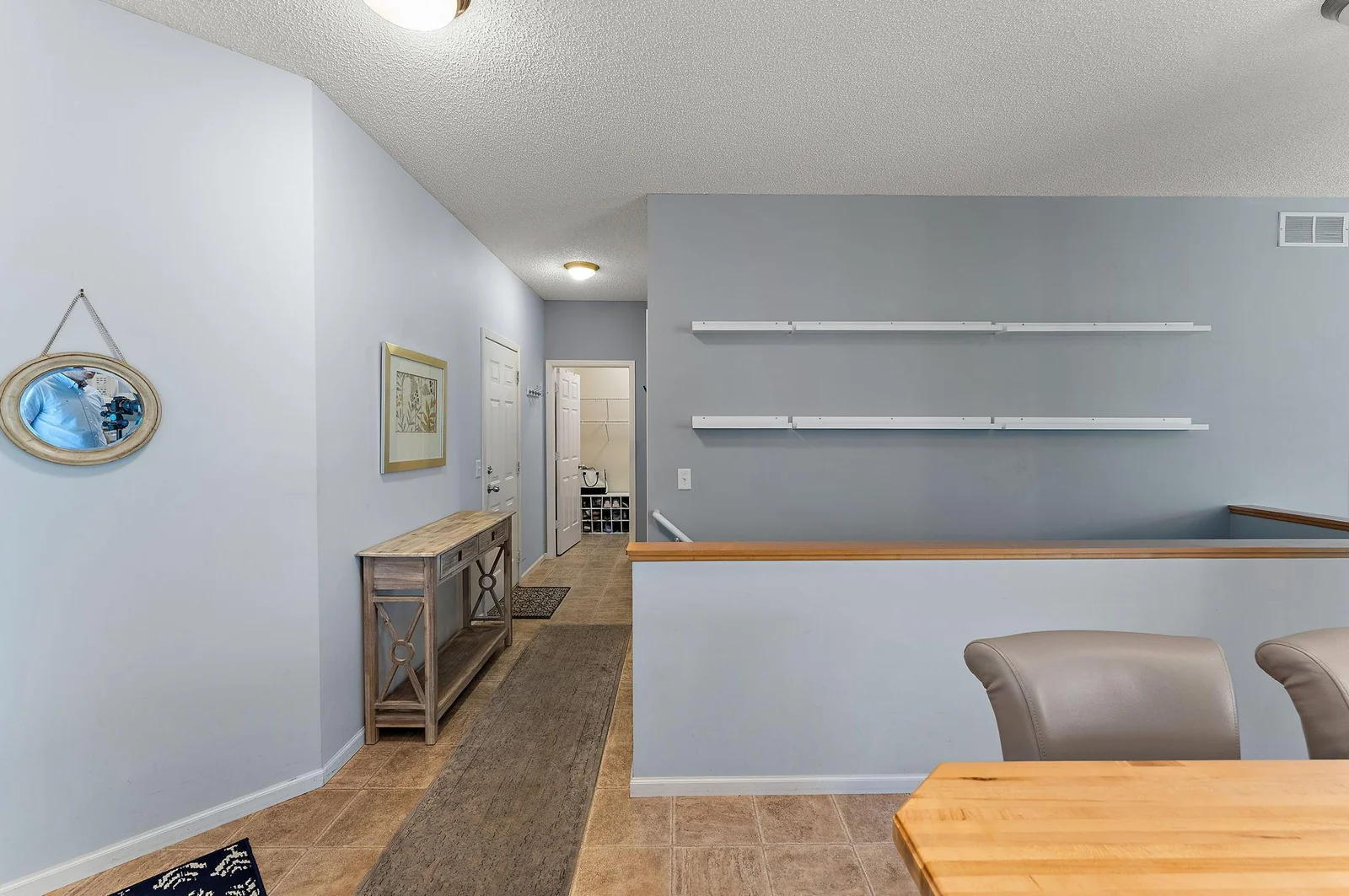 Front Foyer w/ Half Bathroom and Main Level Laundry!