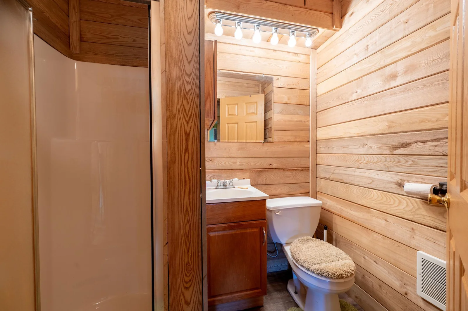 Bathroom with shower surround.
